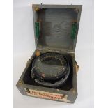 A cased military compass, type P4A, 9" w x 5 1/2" h x 9" d.