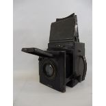 A Thornton Pickard Junior Special box camera, 9" w (excluding opened front flap) x 13" h x 6" d.