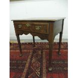 A Georgian burr walnut lowboy with brass handles, 28 3/4" w x 27 3/4" h x 19 1/2" d.