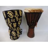 A Kambala African drum in case, 25 1/2" h.