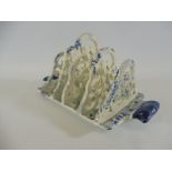 A 19th Century blue and white pearlware four division toast rack.