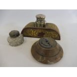 An unusual Art Nouveau brass mounted desk top inkwell and two others.