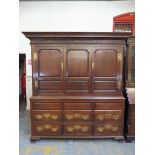 A good 18th Century oak housekeeper's cupboard of good colour and proportions, the upper section