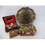Two boxes of assorted costume jewellery, a quantity of silver plated spoons, jewellery boxes etc.
