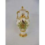 A Royal Crown Derby limited edition two handled lidded vase, stamped underneath 'Veenal Equinox' and