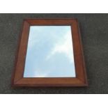 An early Victorian oak country house rectangular wall mirror, 26 x 33".