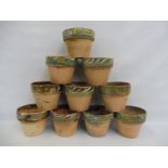 A set of flower pots with marbled decoration, each 4 1/2" h.