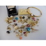 A selection of earrings, a yellow metal bangle and a cased 9ct gold and platinum ring set with