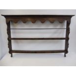 An 18th Century style wall mounted open dresser rack, 54 1/2" w x 36 1/2" h x 7 1/2" d.