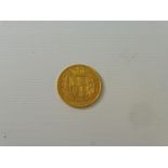 An 1869 gold sovereign, almost very fine/good very fine.