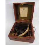 A John Morton & Co. sextant in a mahogany box, 10" w x 5 1/2" h x 9 1/2" d.