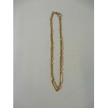 A 15ct gold necklace of elongated loop form, approx. weight 34g.