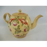 An 18th Century Bristol creamware teapot, with handpainted floral and fruit design and entwined