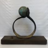 LORENZO QUINN - a superb bronze sculpture in the form of a globe held by a pair of hands