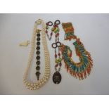 A quantity of assorted jewellery including an unusual part coral necklace.