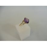 A 9ct gold ring, set with a large Ametista amethyst, by repute 3.52cts, size 9 ring, with