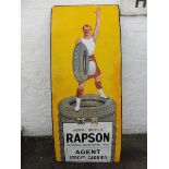 A rare Rapson North British Tyres pictorial enamel sign depicting a Scotsman standing on a stack