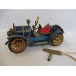 A Schuco clockwork tinplate 1913 Mercer, no.1225, with original key.