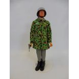 A circa 1970s Action Man in a German paratrouper's uniform, this uniform was only available to buy