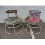 Four original circus elephant stands, one stand has an Austen Circus advertisement attached, circa