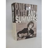 A personally signed book by Andy Summers (of Police fame) titled 'One Train Later', signed for the