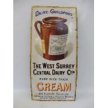 A West Surrey Central Dairy Co's Cream pictorial enamel sign with good gloss, some metal repair
