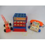 A small quantity of Fisher Price and early learning toys to include telephone, fire engine etc.