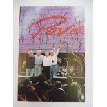 A full set of Pink Floyd signatures, on an image of them on stage, clear signatures, again