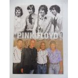 A fully signed retro image of Pink Floyd, nicely signed by all four members of the band, in 2005