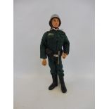 A circa 1970s Action Man, with blond flock hair, in a Colditz Castle German uniform.