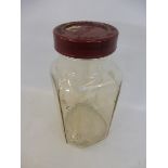 A Holland Toffee glass sweetie jar unusually with raised moulded lettering to the angled corners,