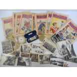 A selection of mixed ephemera including foreign postcards, early Hotspur comics from the late