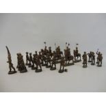 A selection of British WWI Elastolin soldiers including riders and flag bearers.