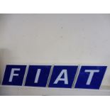 A large FIAT four piece garage showroom illuminated sign by Bloom Signs, each letter formed as an