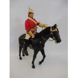 A circa 1970s Action Man household cavalry figure and horse, many accessories, reigns, sword in