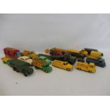 A mixed tray of mainly early Dinky Toys including some military, some commercials, two motorcycles