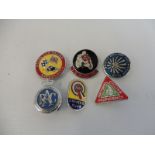 A small group of motoring and motor cycle badges to include the Isle of Mann.