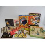 A box of assorted games, toys covering 1960s to 1980s.