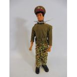 A circa 1970s Action Man figure, a talking commander, still working but plays slow.