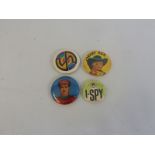 Two original 1960s Captain Scarlet milky bar kid badges and an I-Spy badge.