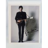 A signed photograph of Paul McCartney, a later image of Paul McCartney dressed up in circa 1962