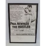 A rare Paul Newman signature (a reluctant signer), on a reproduction film poster for The Hustler.