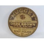 A Nugget Dark Brown Stain Polish tin easel display sign, 8 1/2" diameter.