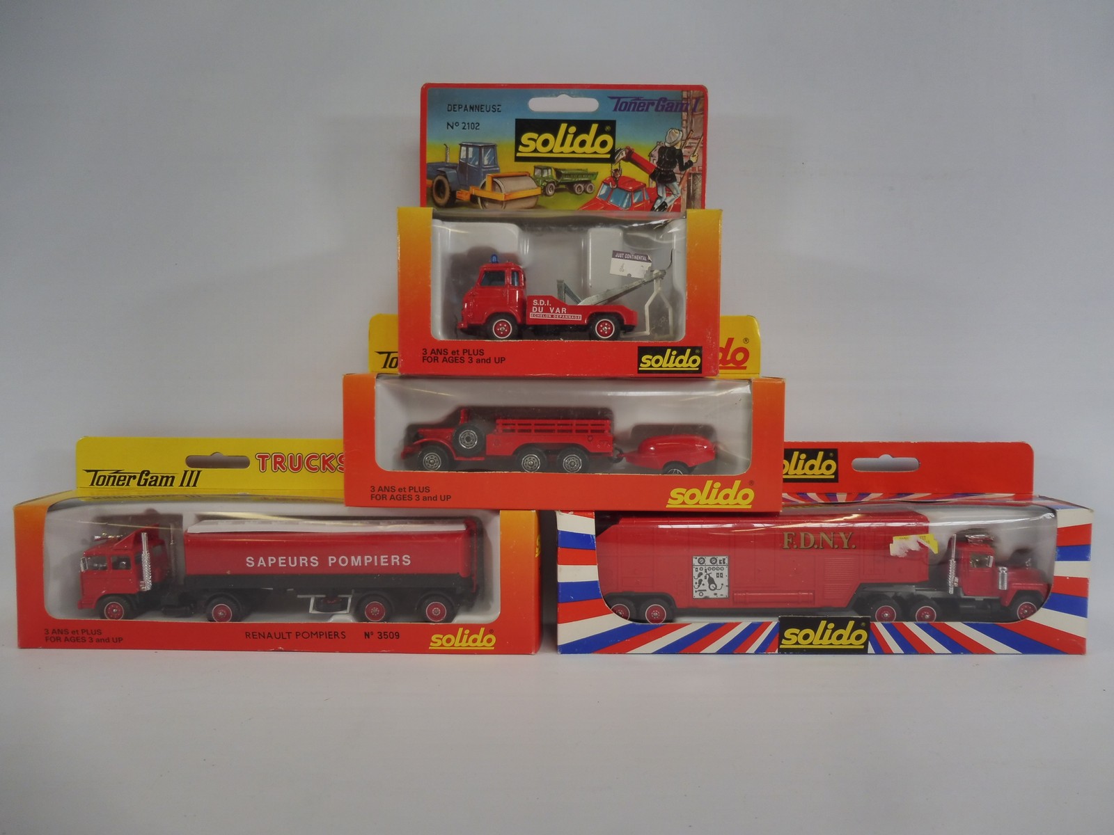 Four boxed Solido fire emergency vehicles, box condition good, to include Dodge, Mack, Renault etc.