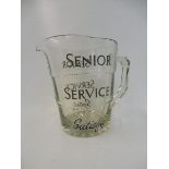 A Senior Service glass advertising jug.