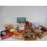 An interesting box of mainly 1950s toys, boxed and loose, mostly English makers, plus a box full