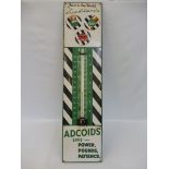 A Duckham's Adcoids black and white enamel thermometer, 11x 45 1/2".