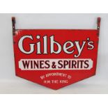 A Gilbey's Wines & Spirits 'by appointment to H.M.The King' double sided enamel sign in excellent