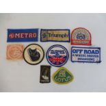 A small group of original car and motorcycle patches.