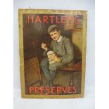 A Hartley's Preserves pictorial showcard depicting a boy sat on a table eating jam, with original